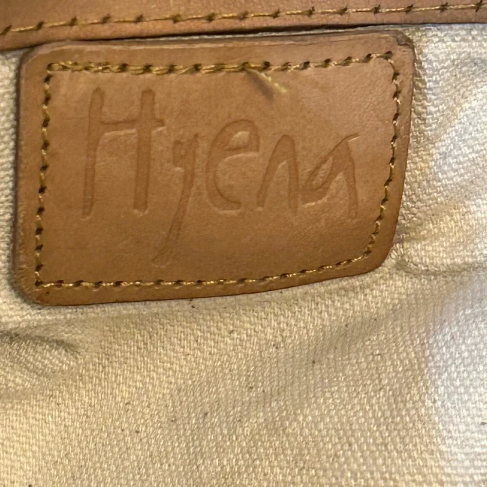 Hyena indigo tie-dye (shibori) pattern on canvas leather strap closure